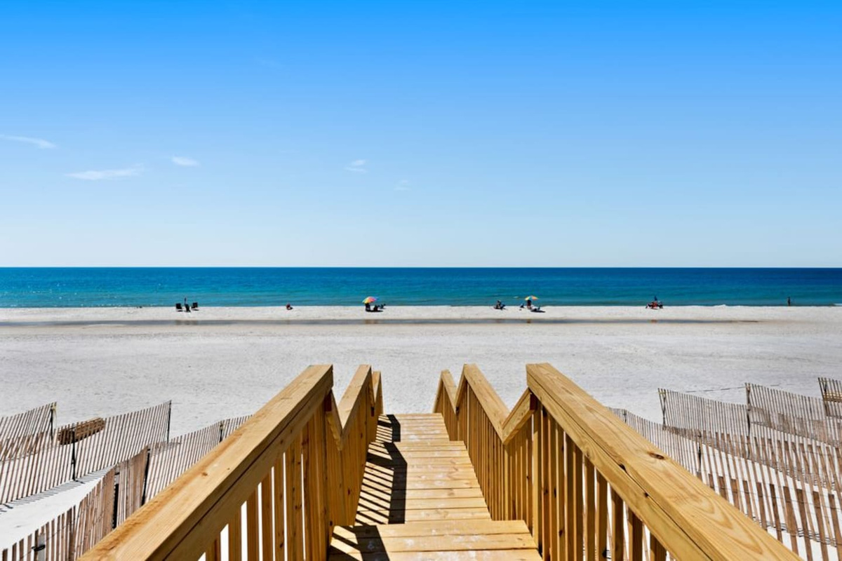 Count them if you want: 90 steps from your back deck to white Gulf sand. The title isn't a figure of speech.