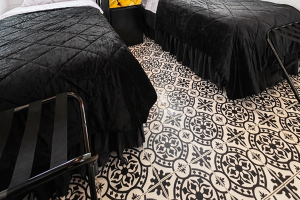 Thoughtful touches like patterned tile floors, soft lighting, and compact amenities make it comfortable and charming. It’s a unique, budget-friendly stay that blends frontier flair with modern convenience.