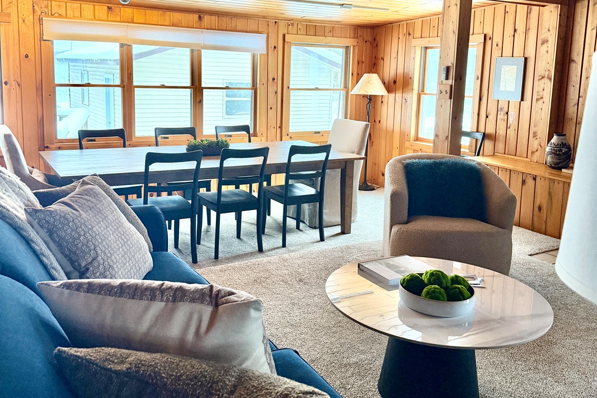 The sun streams in from the lake in the afternoon, washing the main living area for the golden hour.