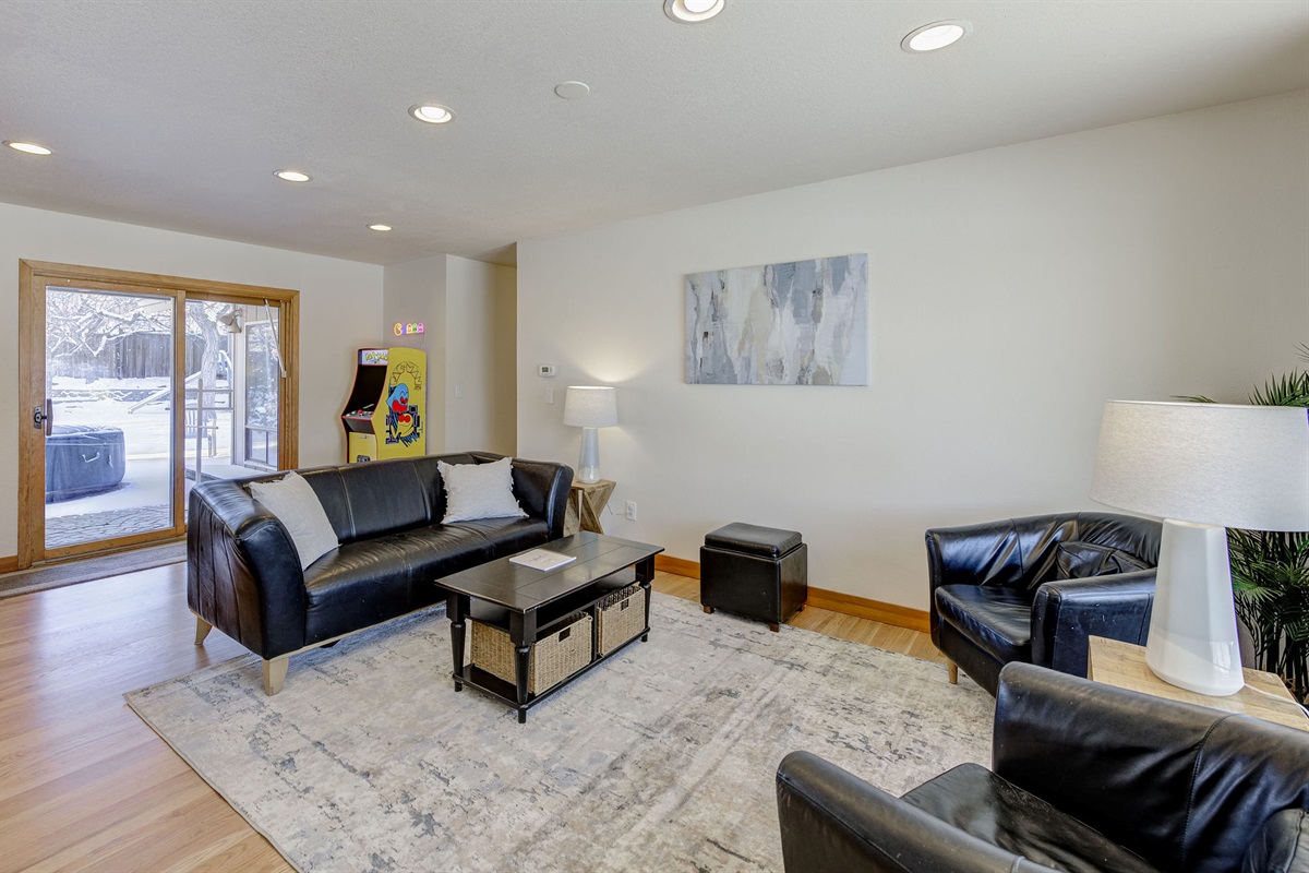 Family Room perfect for games and conversations with a PAC-Man arcade game.