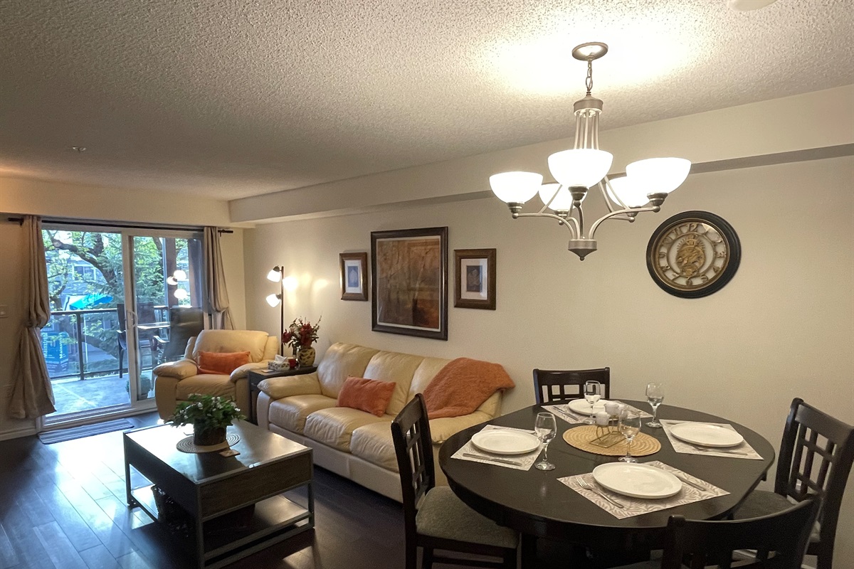 Cozy couch and open concert dining room.