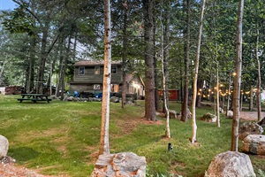 Exterior picture of the house in the middle of the woods
