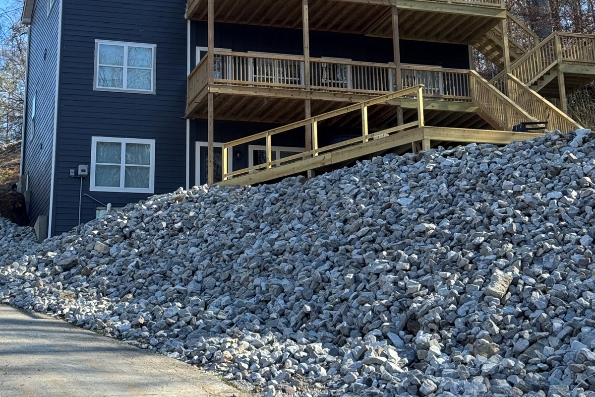 Deck view with huge concrete patio.
