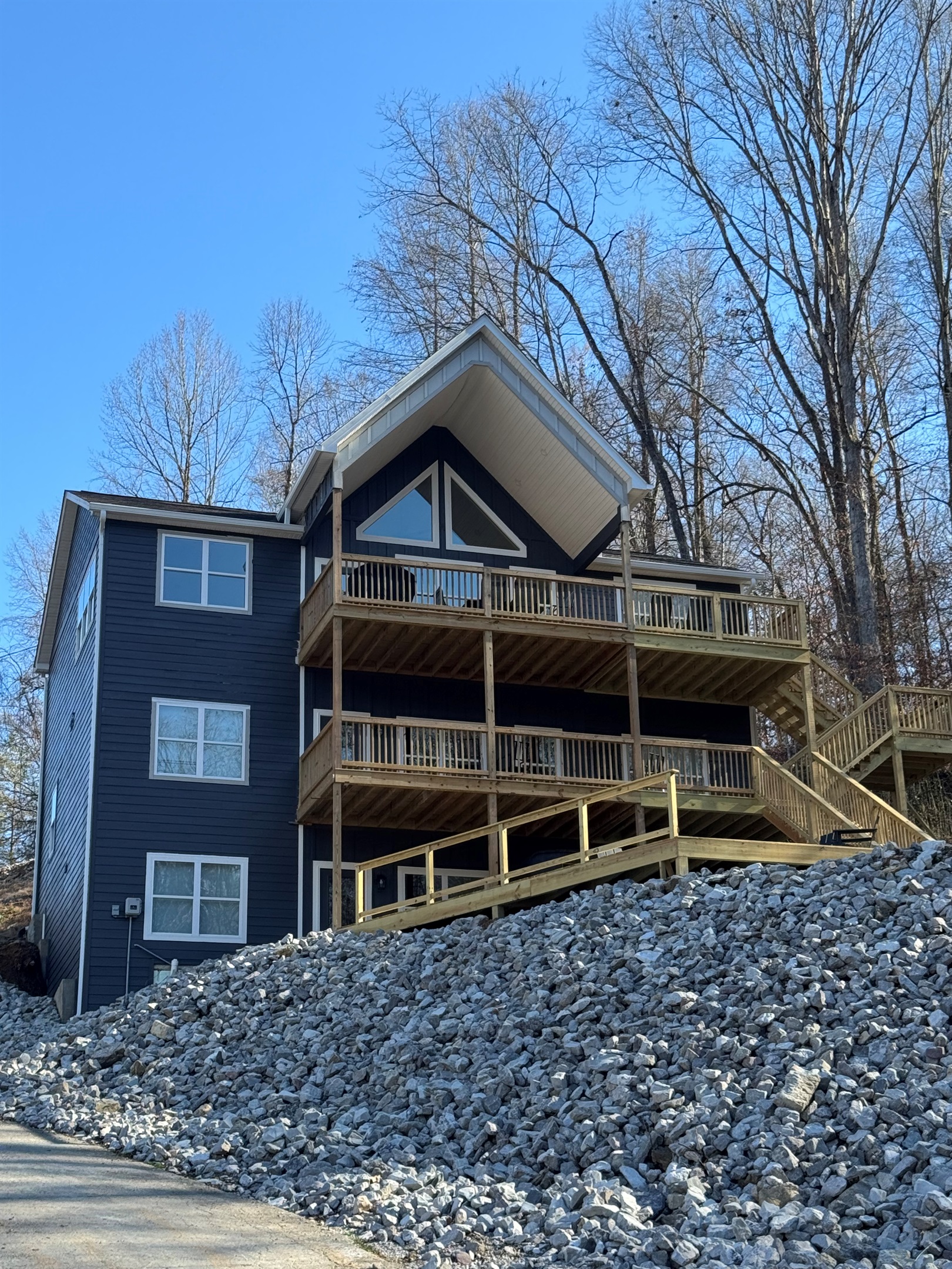 Deck view with huge concrete patio.