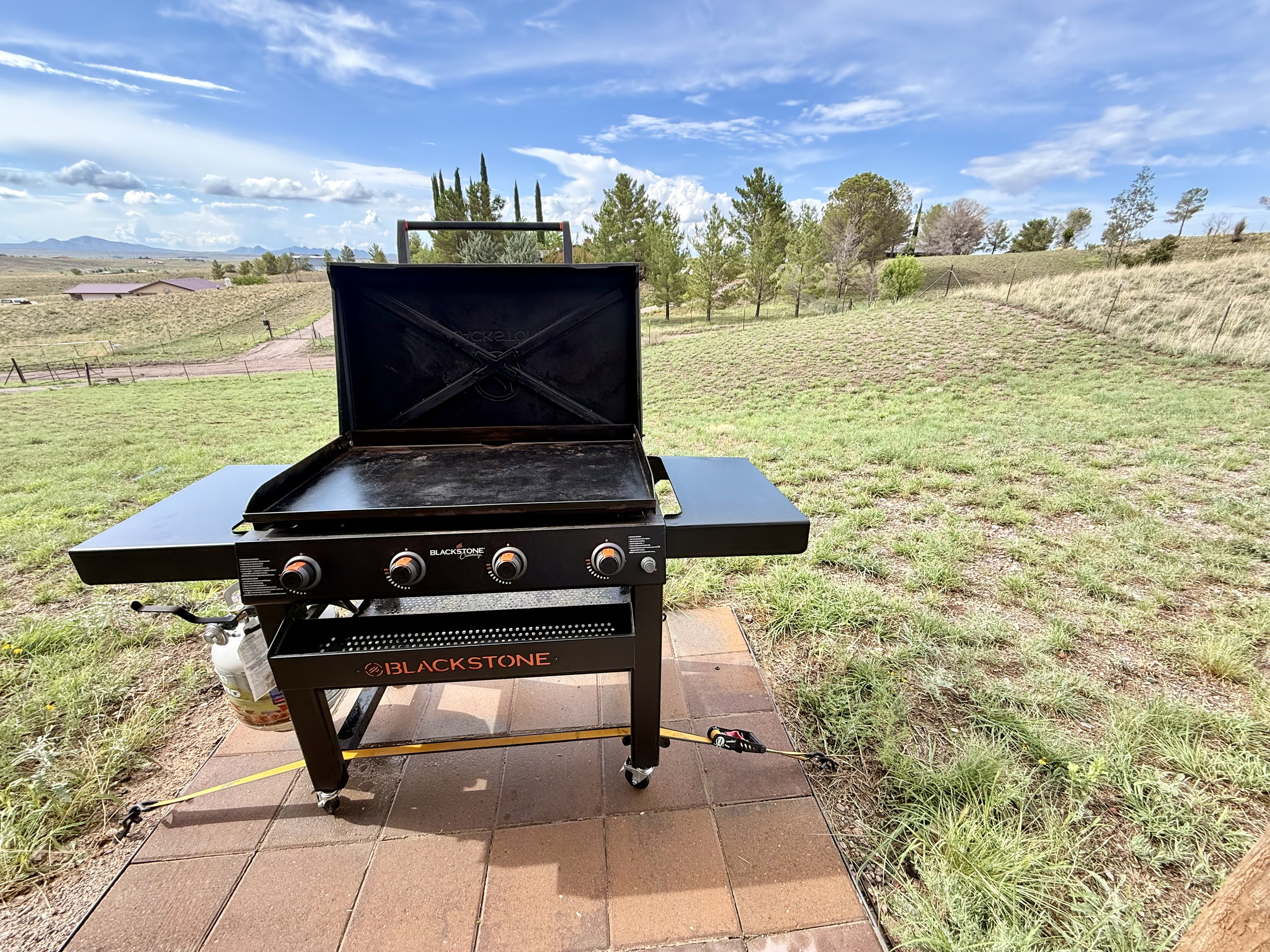 Blackstone griddle. Strapped down due to high winds.