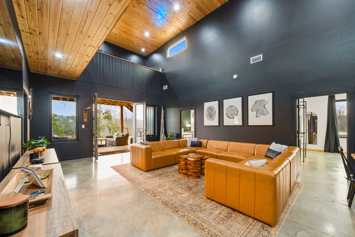 With plenty of seating for the whole group, this living space is ideal for movie nights, big conversations, or simply stretching out and relaxing.