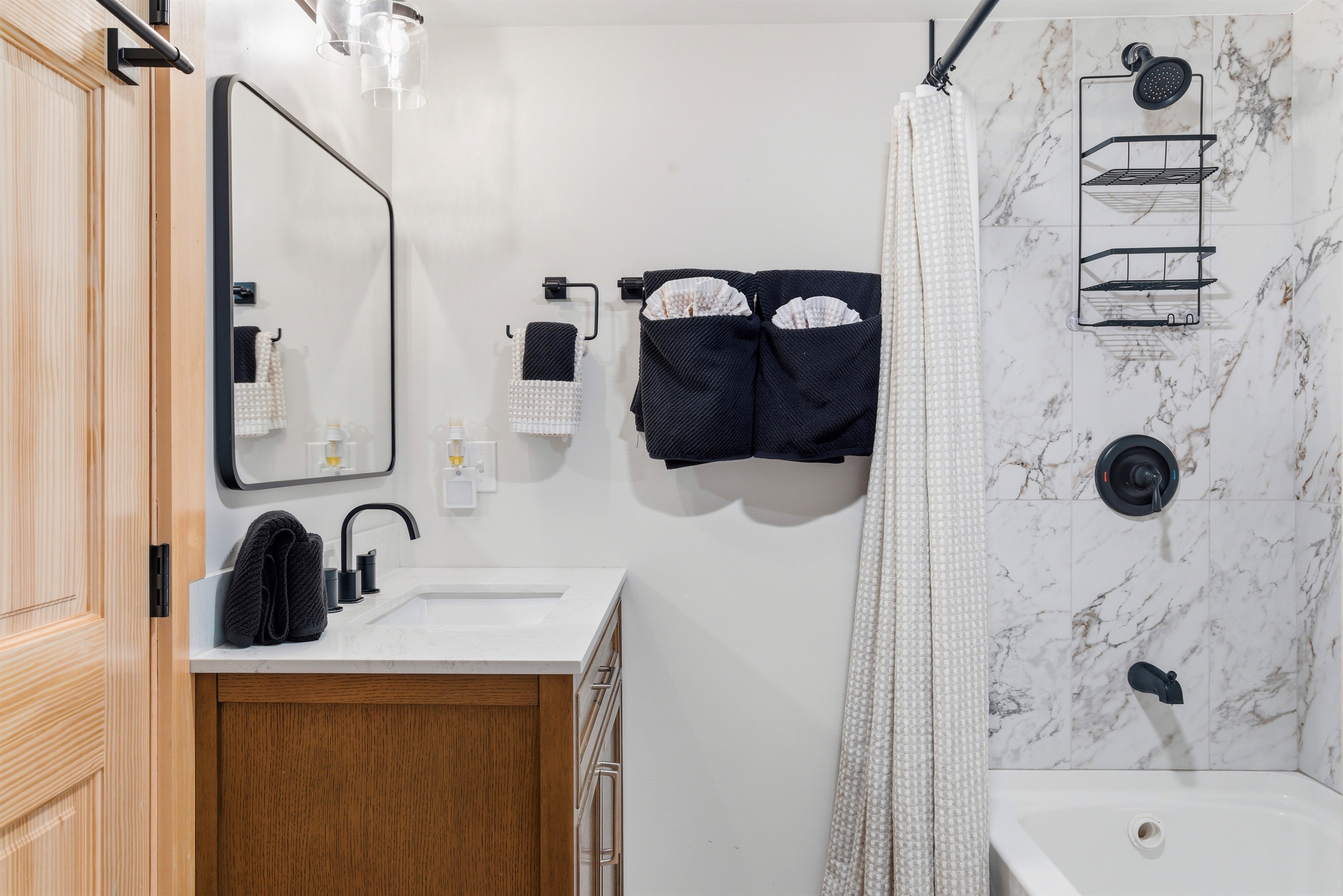 Unwind in the full bathroom with a relaxing bathtub after a day of adventure.