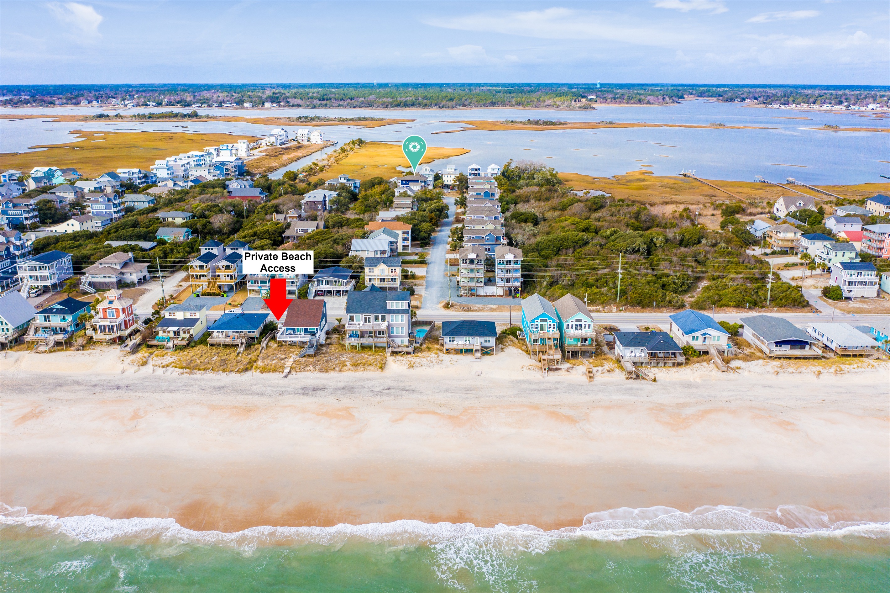 Aerial look at the private beach access and the stunning coastline