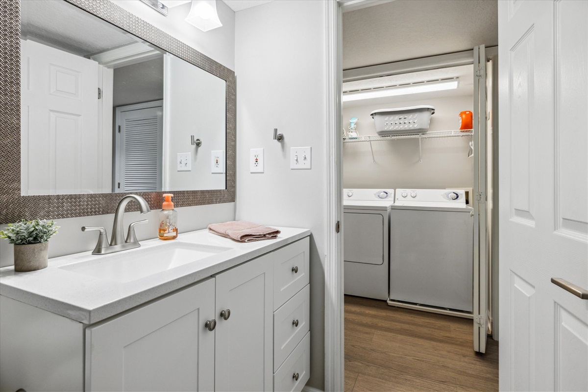 Shared bath across from laundry center