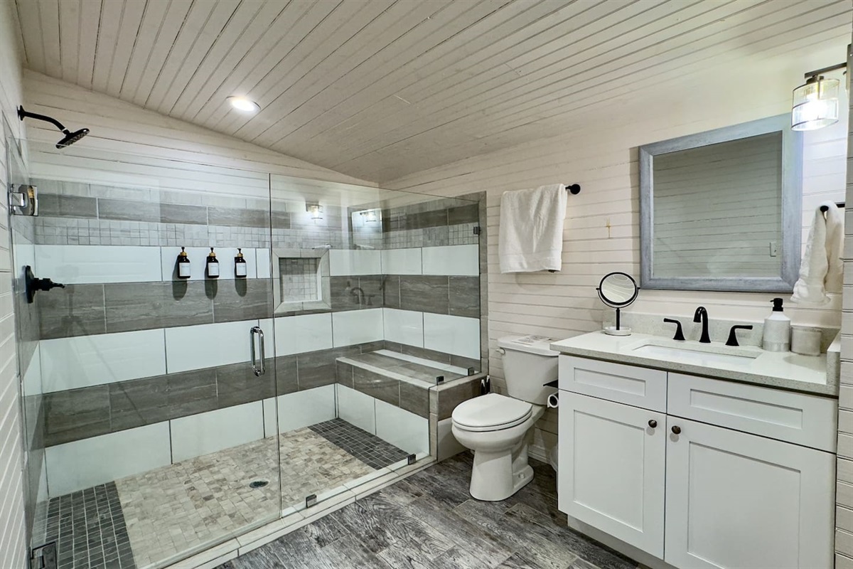 Convenience at its best—laundry and bath in one stylish setup.