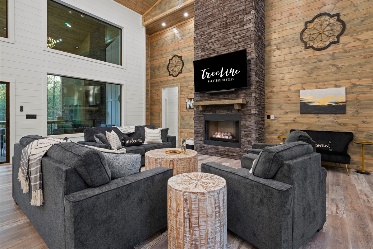 With plenty of comfortable seating and natural light pouring in, the living area offers the perfect blend of relaxation and space to spread out.