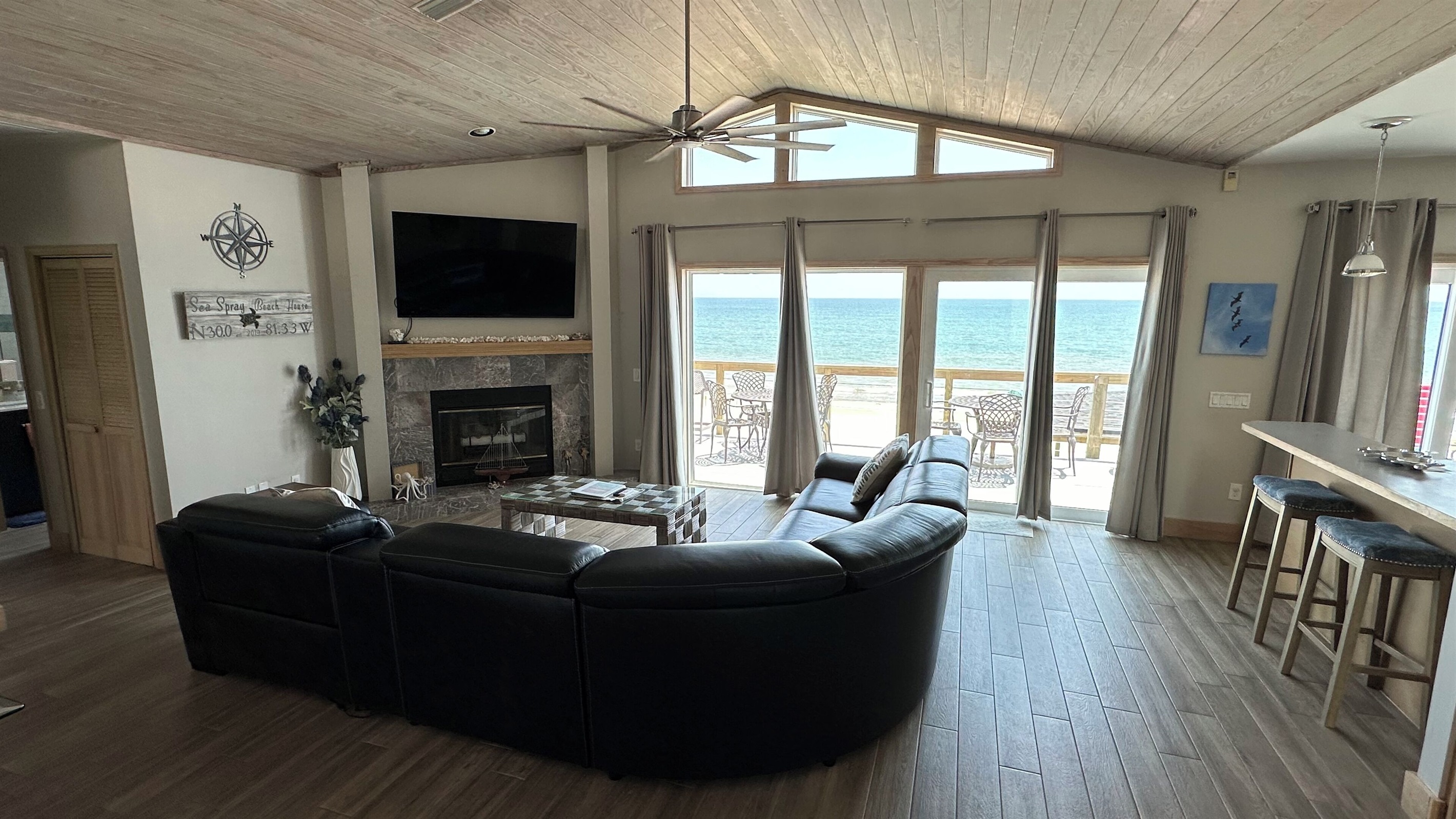 Dining room, family room and kitchen all open to the ocean views.