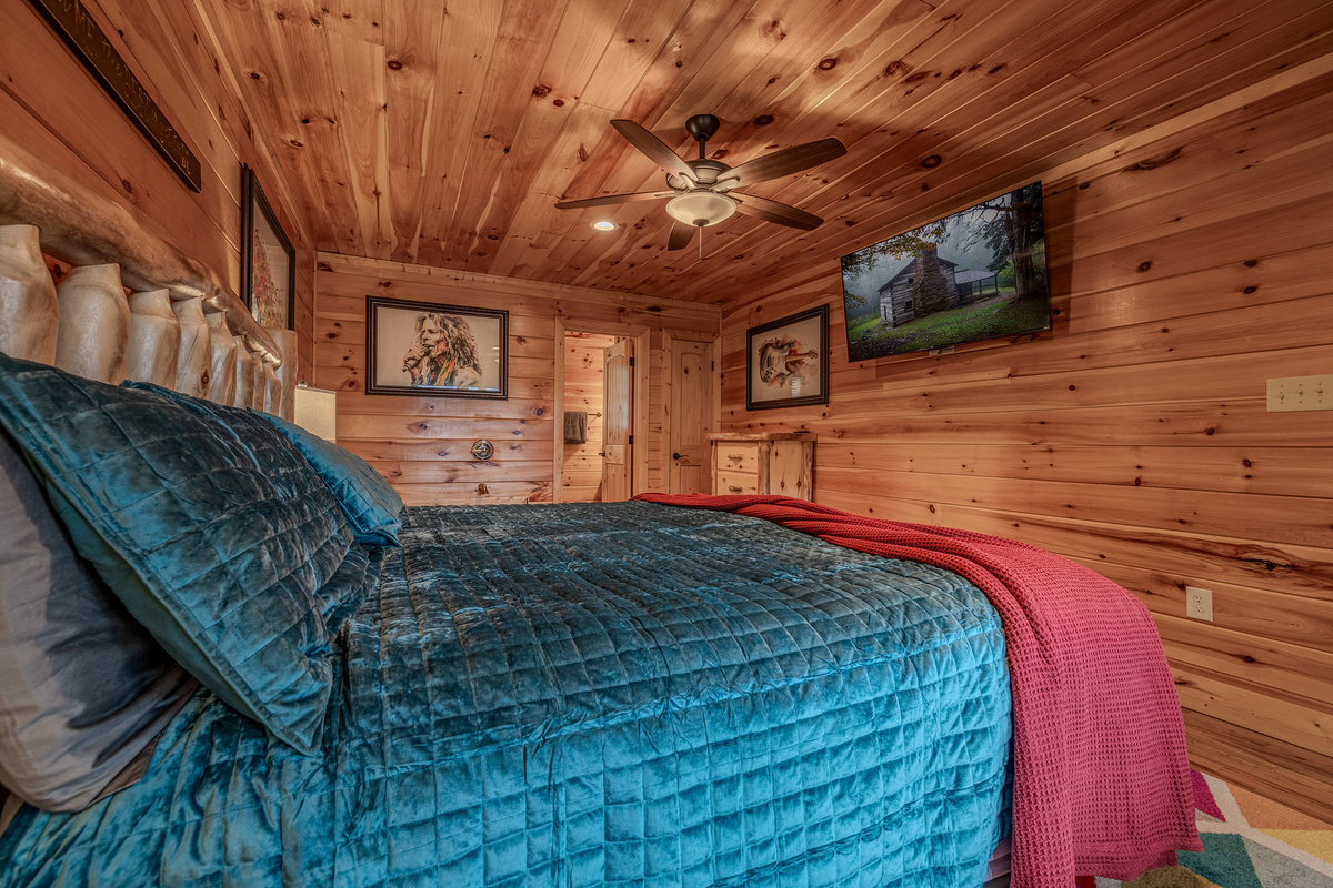 Rich textures, warm lighting, and music-inspired details give The Headliner Suite its polished retreat feel.