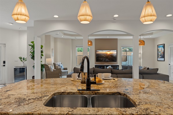 Gather at the expansive bar and savor cooking in a fully equipped, spacious kitchen.