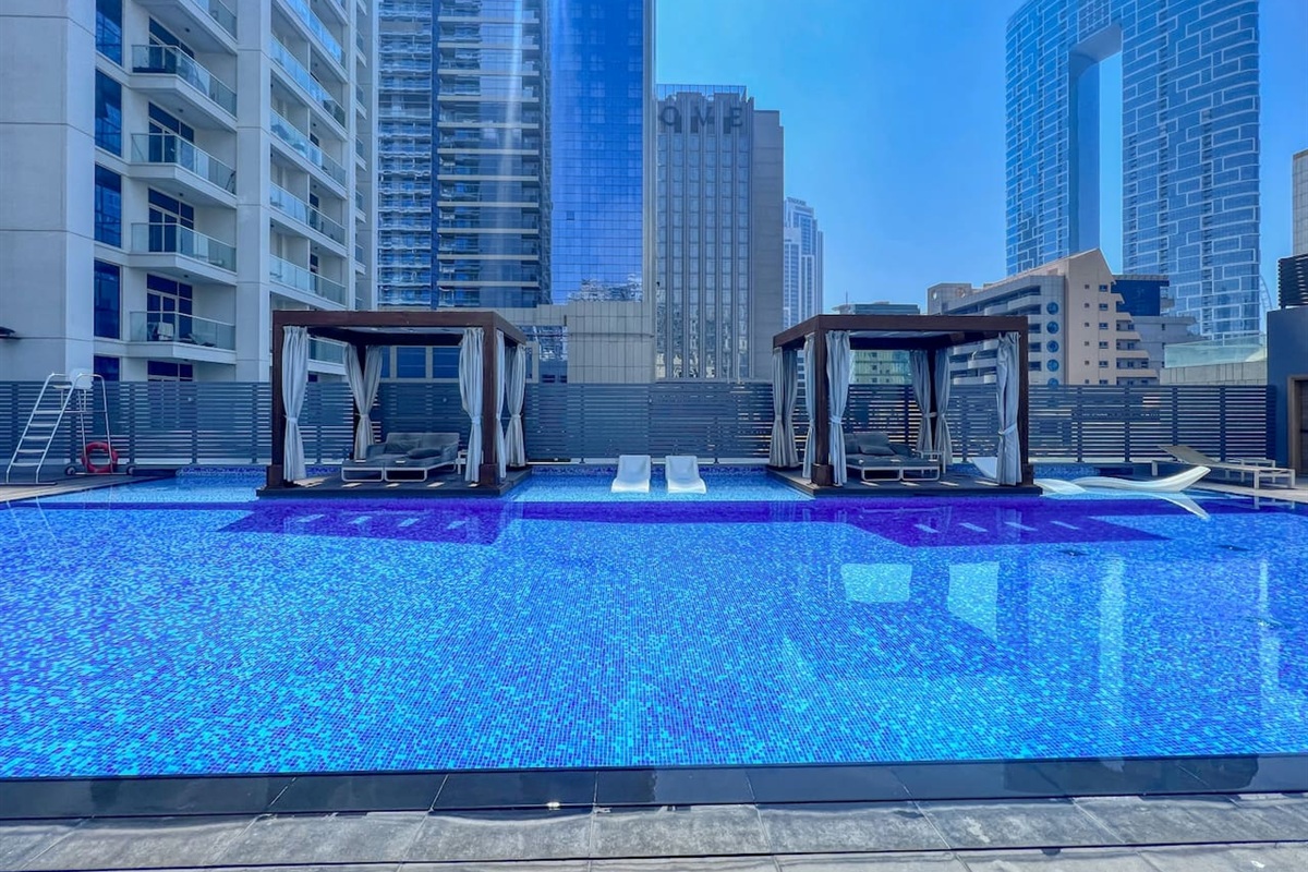 Stunning swimming pool with temperature controlled water, Jacuzzi, sunbeds and cabanas free for guests