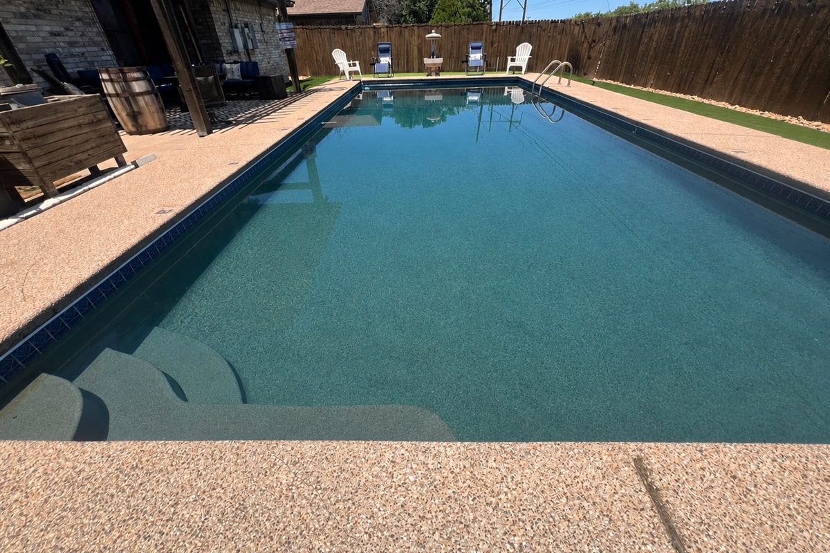 Swim laps in the extra large pool