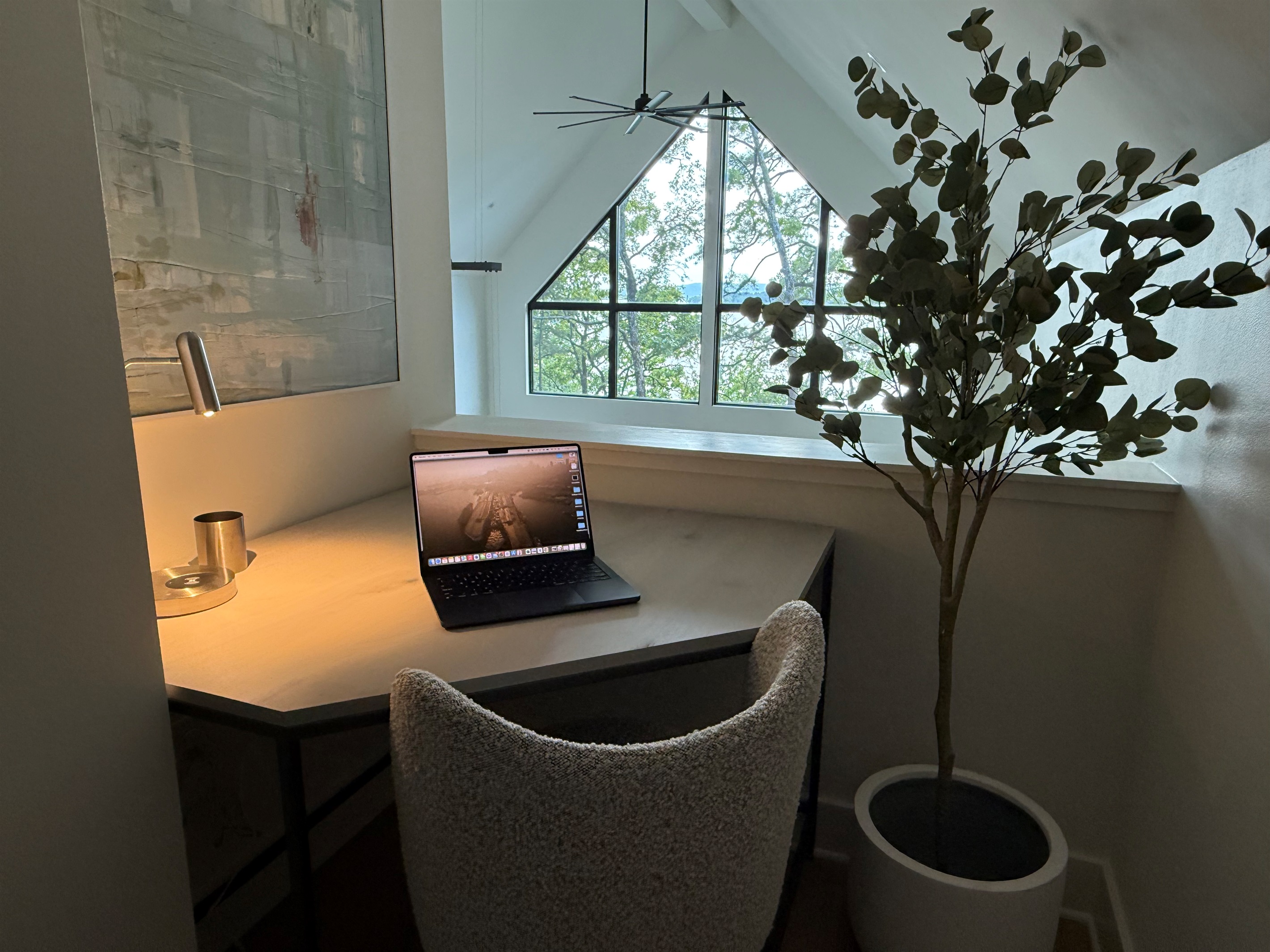 Need to catch up on emails or take a call? This tucked-away desk nook with lake views makes remote work feel a little more like vacation.