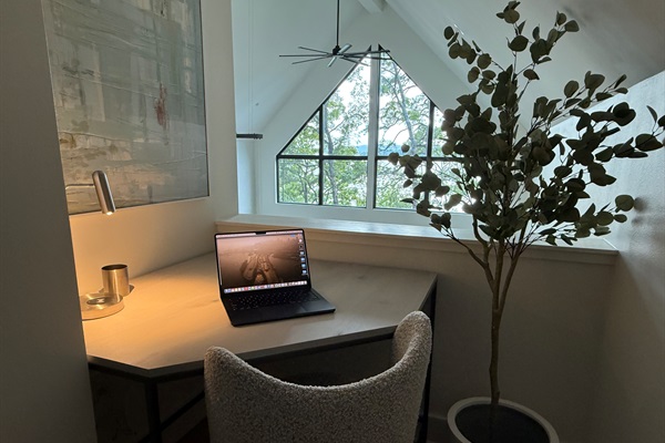 Need to catch up on emails or take a call? This tucked-away desk nook with lake views makes remote work feel a little more like vacation.