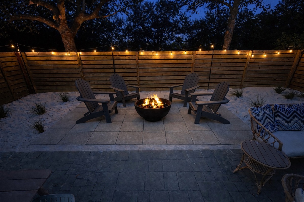 Unwind by the fire pit in your private, fully fenced backyard: the perfect spot for evening drinks and late-night conversation.