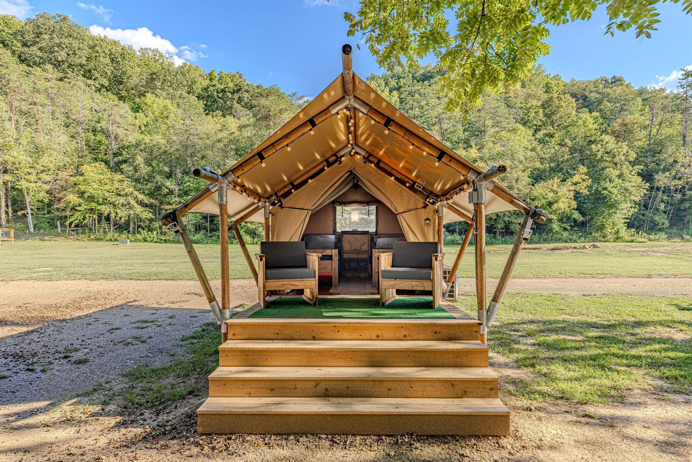 Welcome to Libra! Your home away from home. Step up to your luxury tent, with a spacious deck perfect for morning coffee and enjoying the sounds of nature.