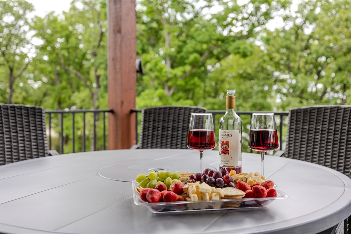 Outdoor dining with wooded views