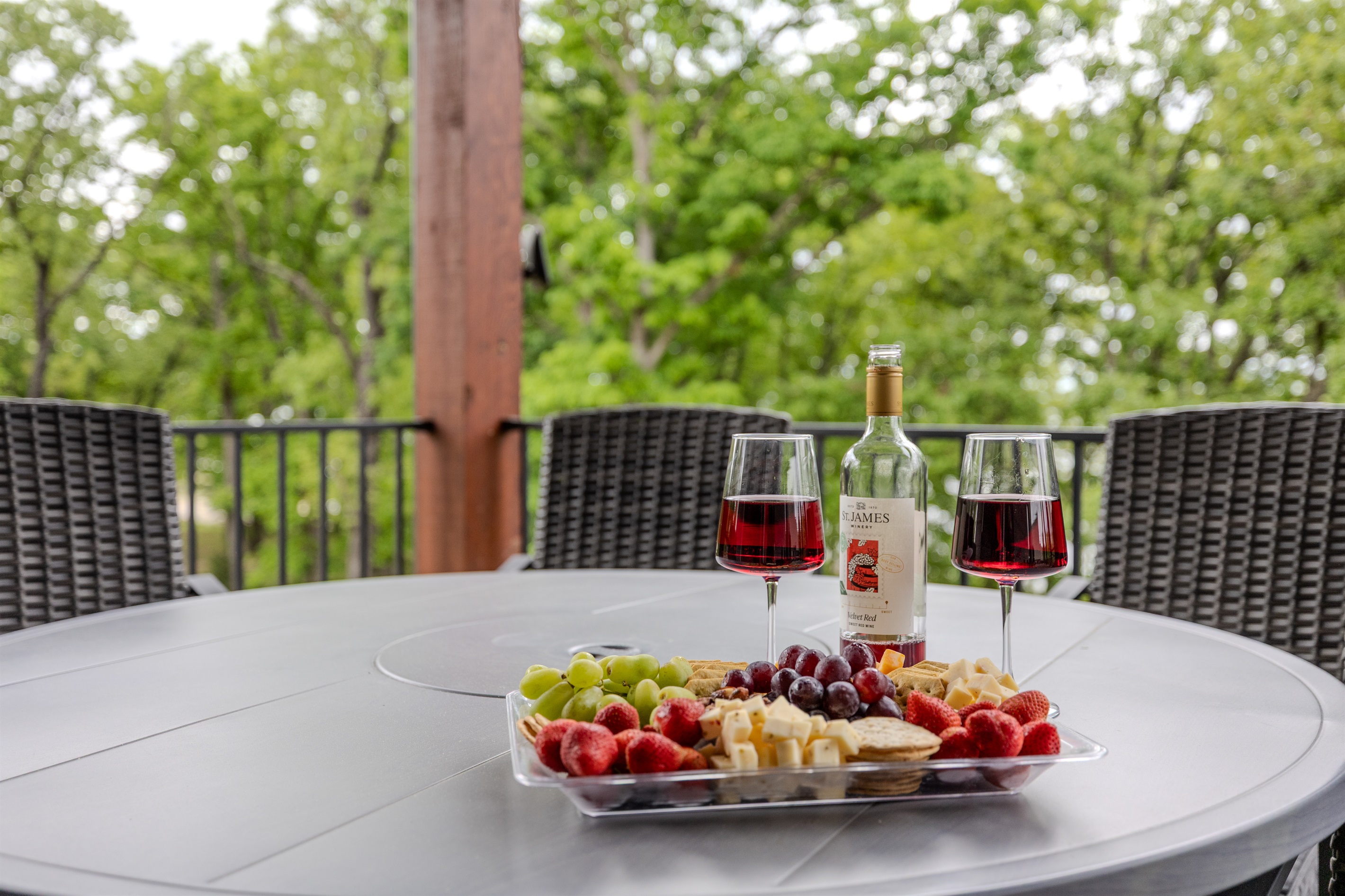 Outdoor dining with wooded views