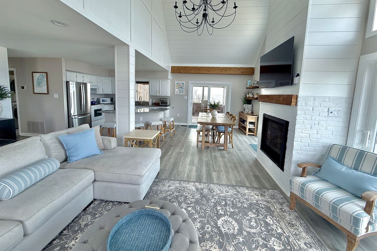 Settle into the inviting open-concept living area, where cozy seating meets a bright, airy design. It is the perfect, relaxed retreat for family and friends to gather, unwind, and cherish every moment of their dream vacation together.