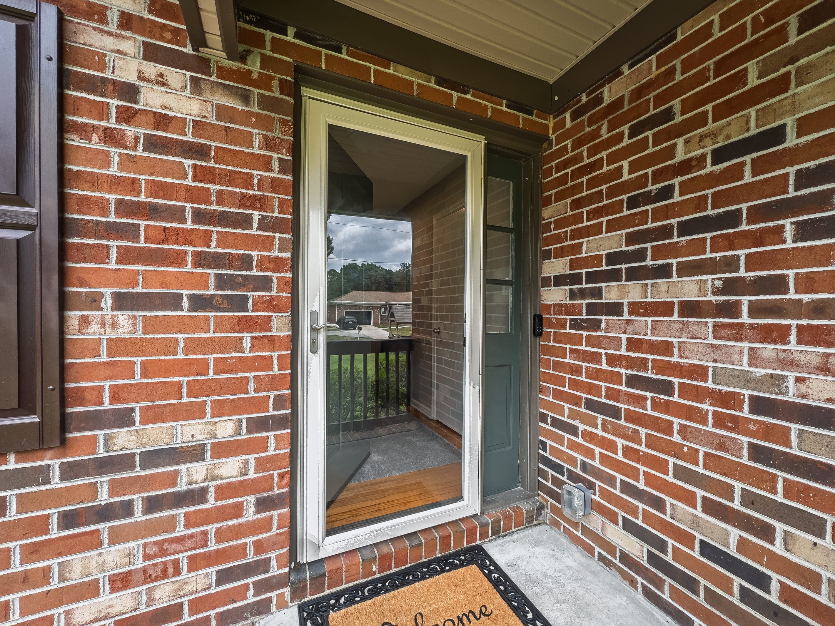 Front entry, covered porch, storm door