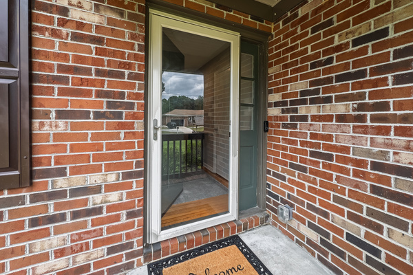 Front entry, covered porch, storm door