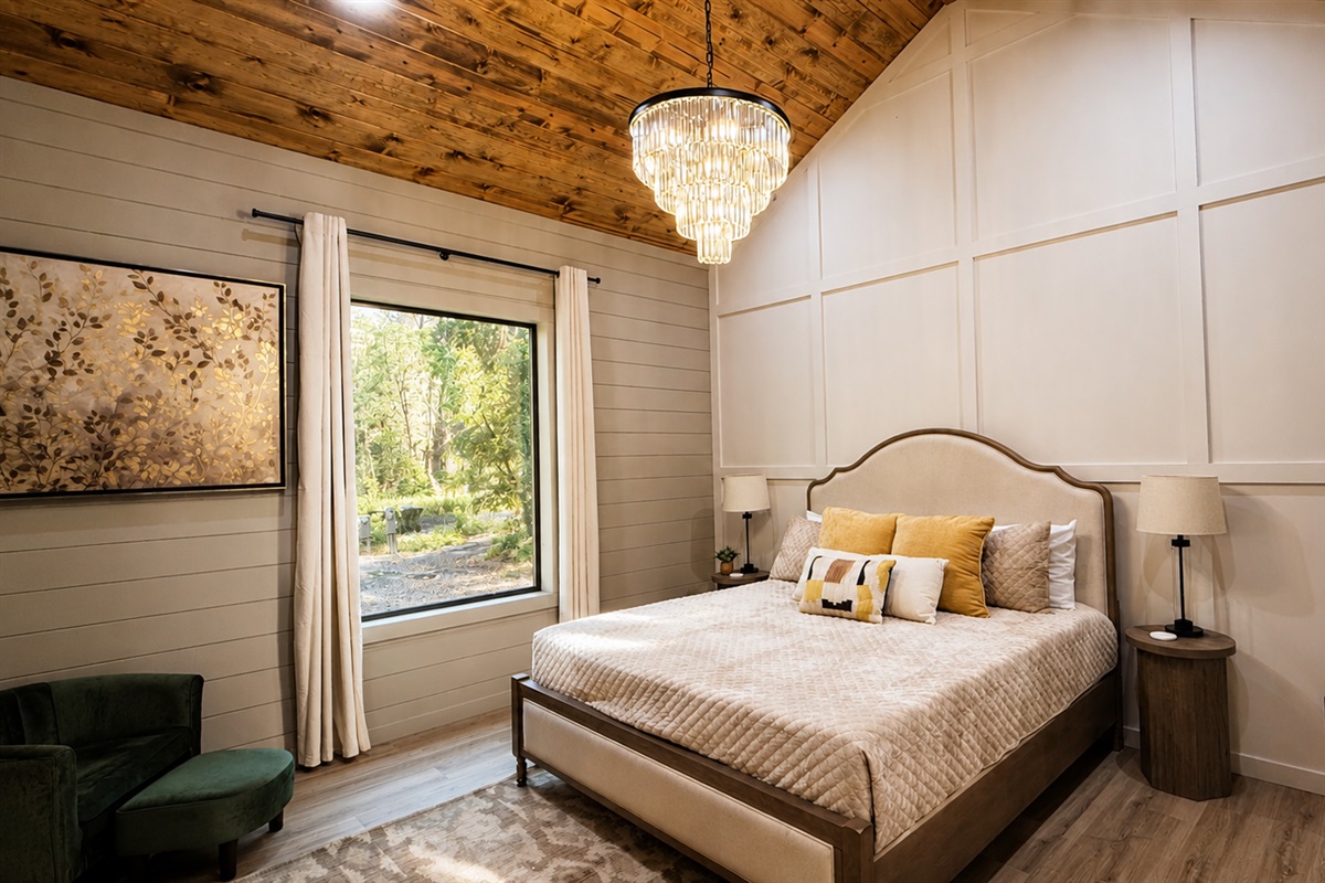 Serene Bedroom Retreat: Enjoy lavish comfort with stunning views and elegant decor!