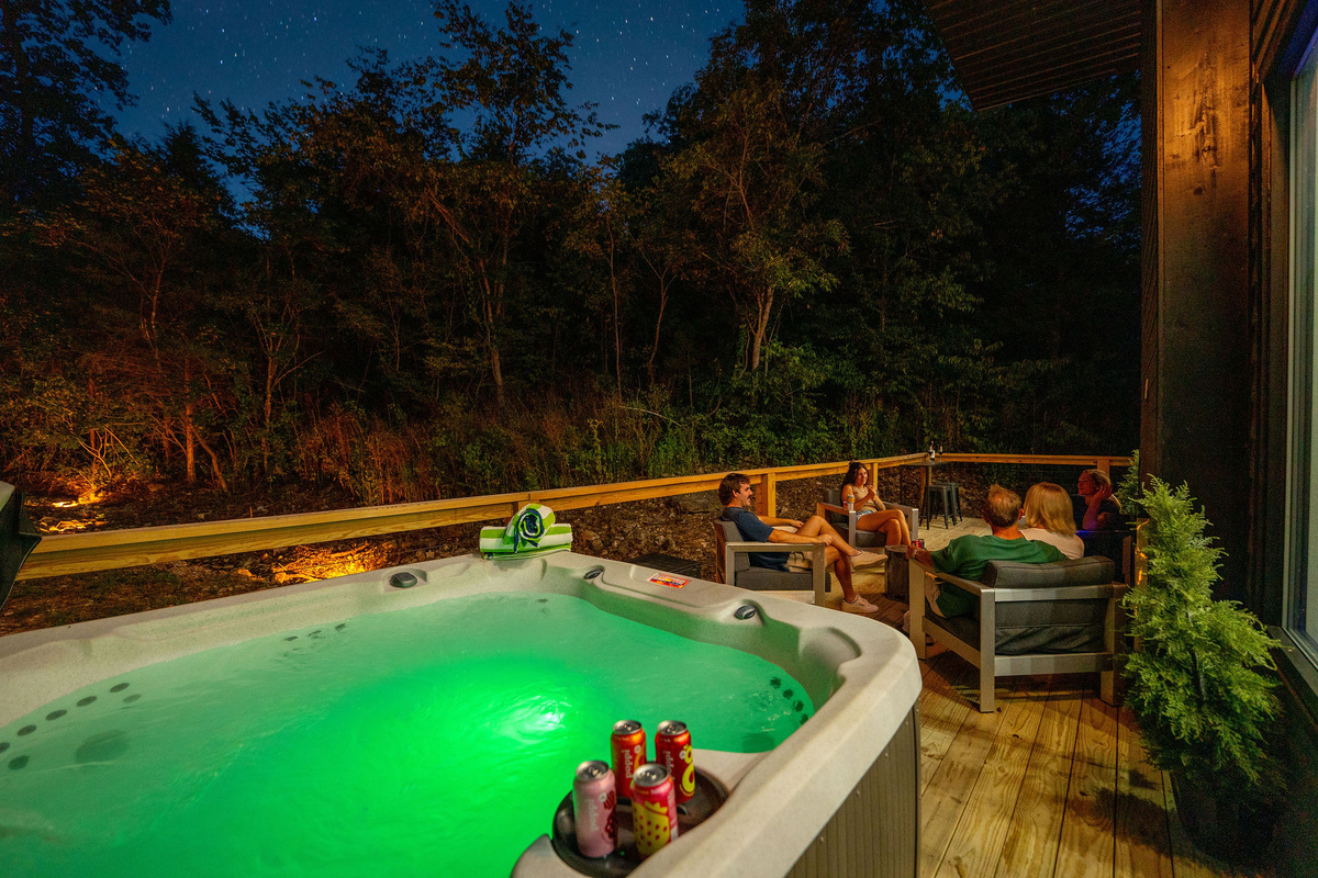 Soak beneath the trees in your private hot tub, available to enjoy year-round.