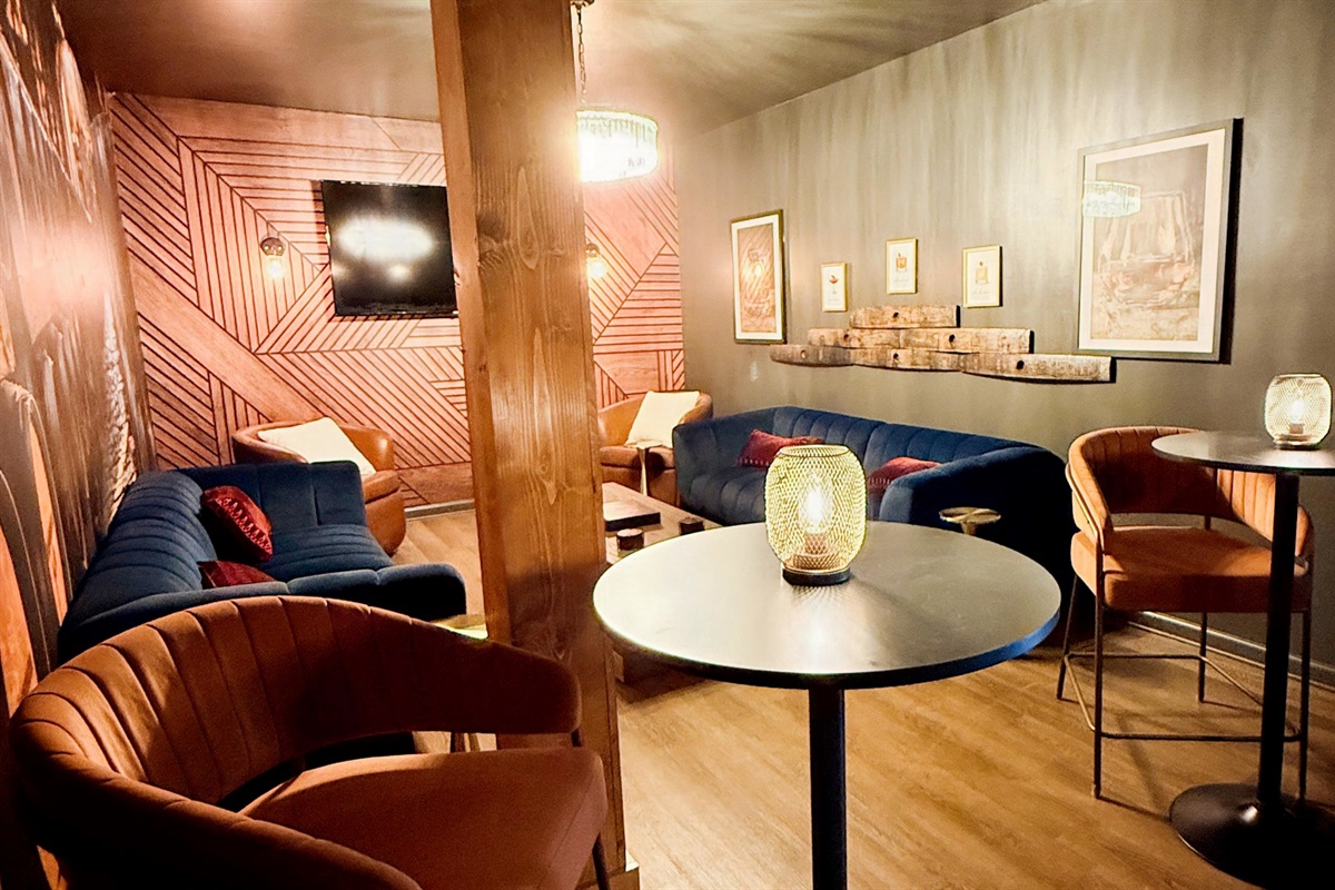 Descend to the Tasting Room — Rick Row 7 — a hidden lounge of rich textures, bourbon hues, and conversation-ready corners where design and comfort pour together perfectly.