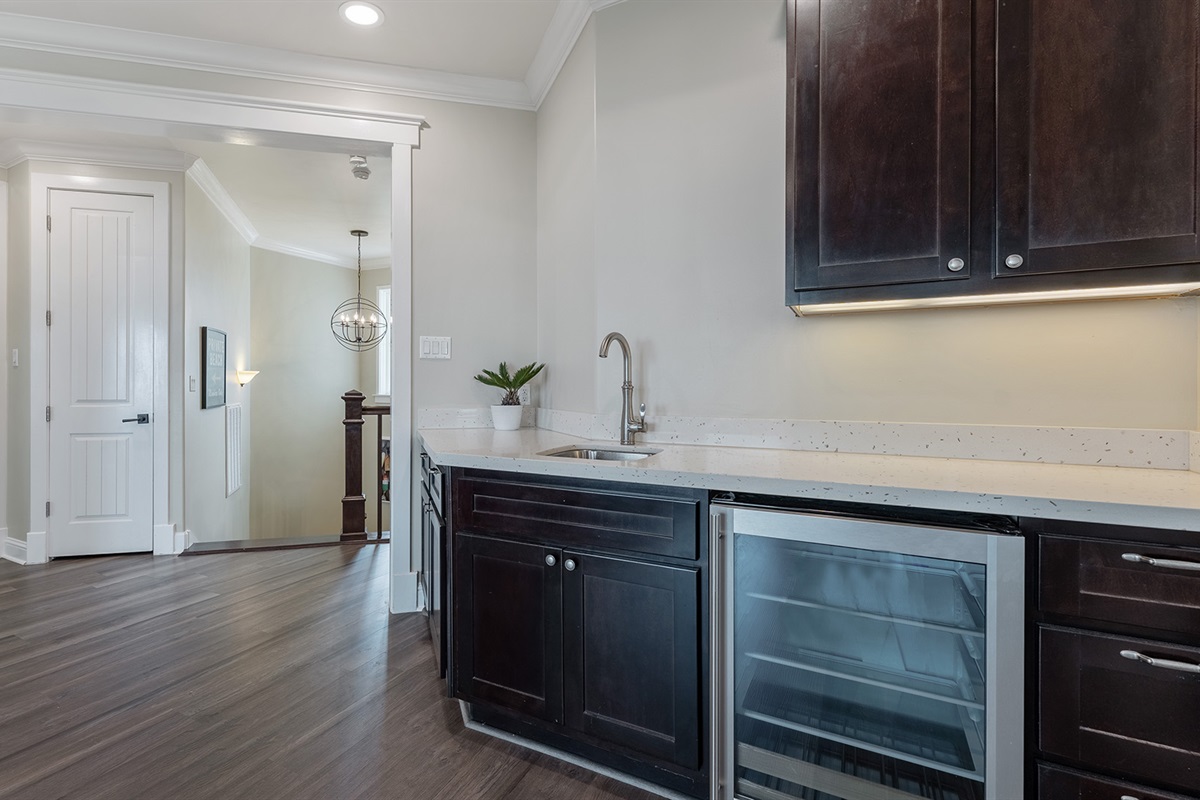 2nd Floor Living Room: With sink, fridge, and wet bar for unwinding at the end of the day.