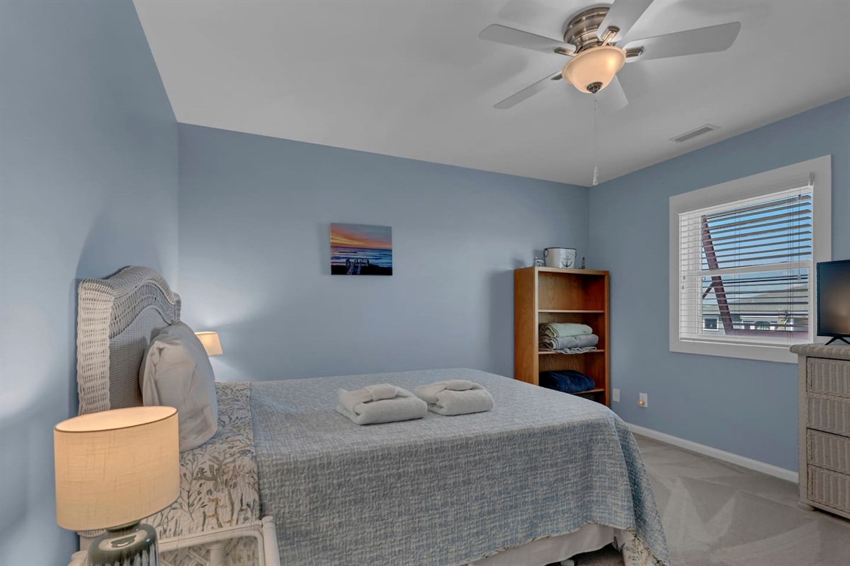 This bedroom also contains a set of bunk beds