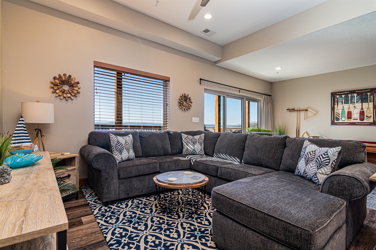 Large, cozy sectional on the lower level.
