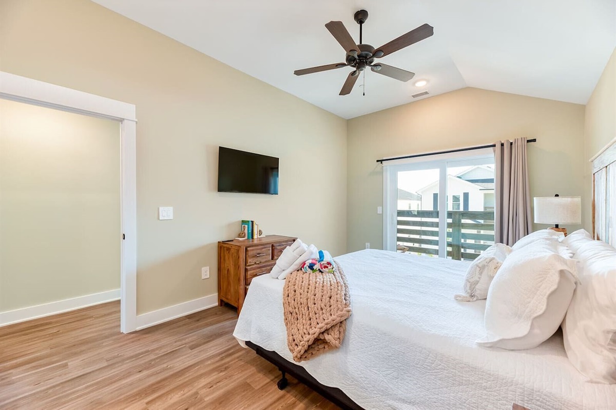 Enjoy direct access to your own outdoor balcony from the primary suite.