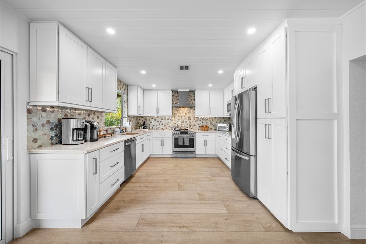 Bright, open kitchen with modern finishes and ample counter space