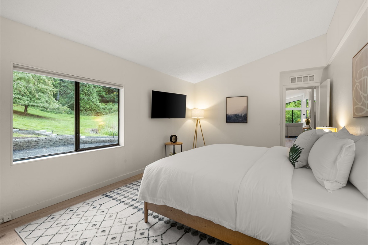 Wake up to peaceful meadow views from the comfort of a king bed dressed in soft cotton linens