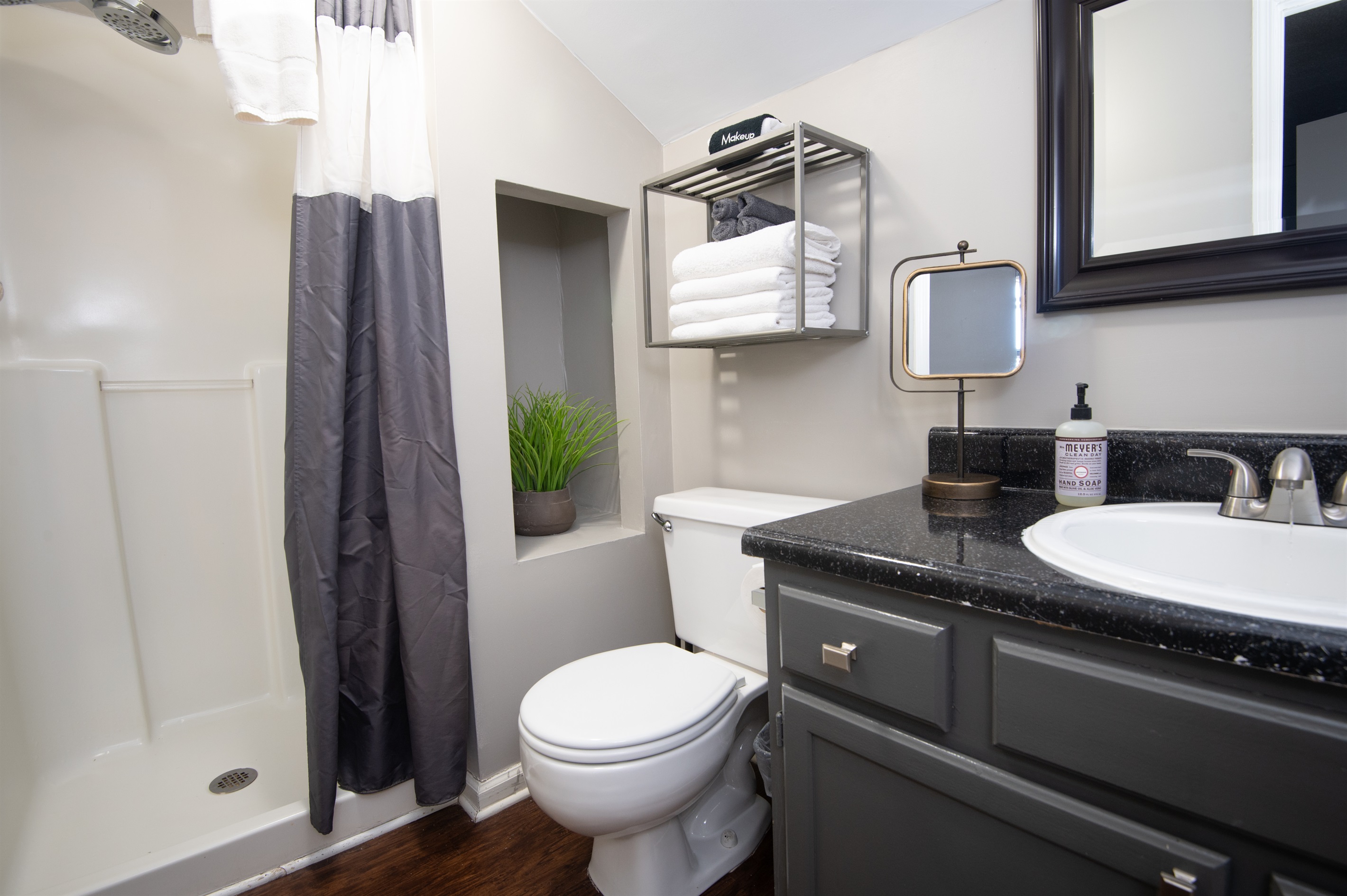 Both bathrooms in unit G rest inside the bedrooms, which makes privacy easy! There are plenty of towels for you, freshly washed, along with hair dryers, hair and body soaps, and more!