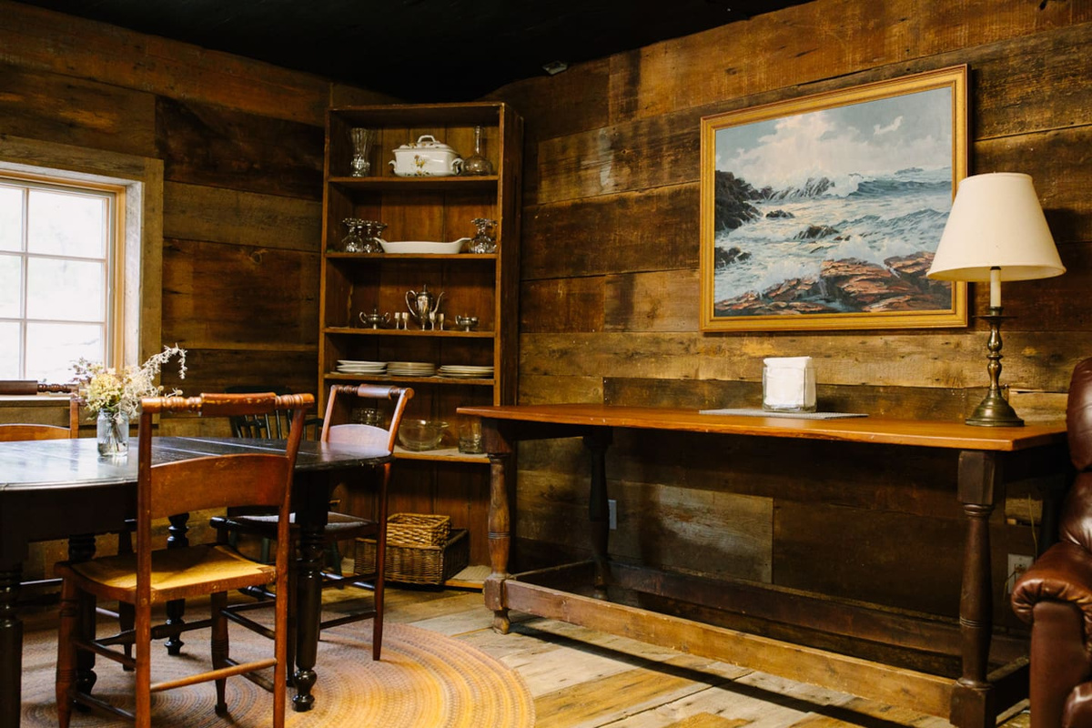 A glimpse of dining room with antique sideboard.