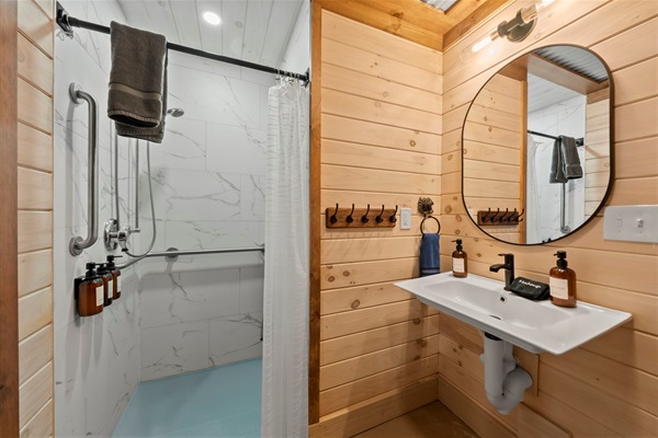 Lower-Level Wheelchair Friendly Fourth Bathroom Shared between Rec Room & Pool Room