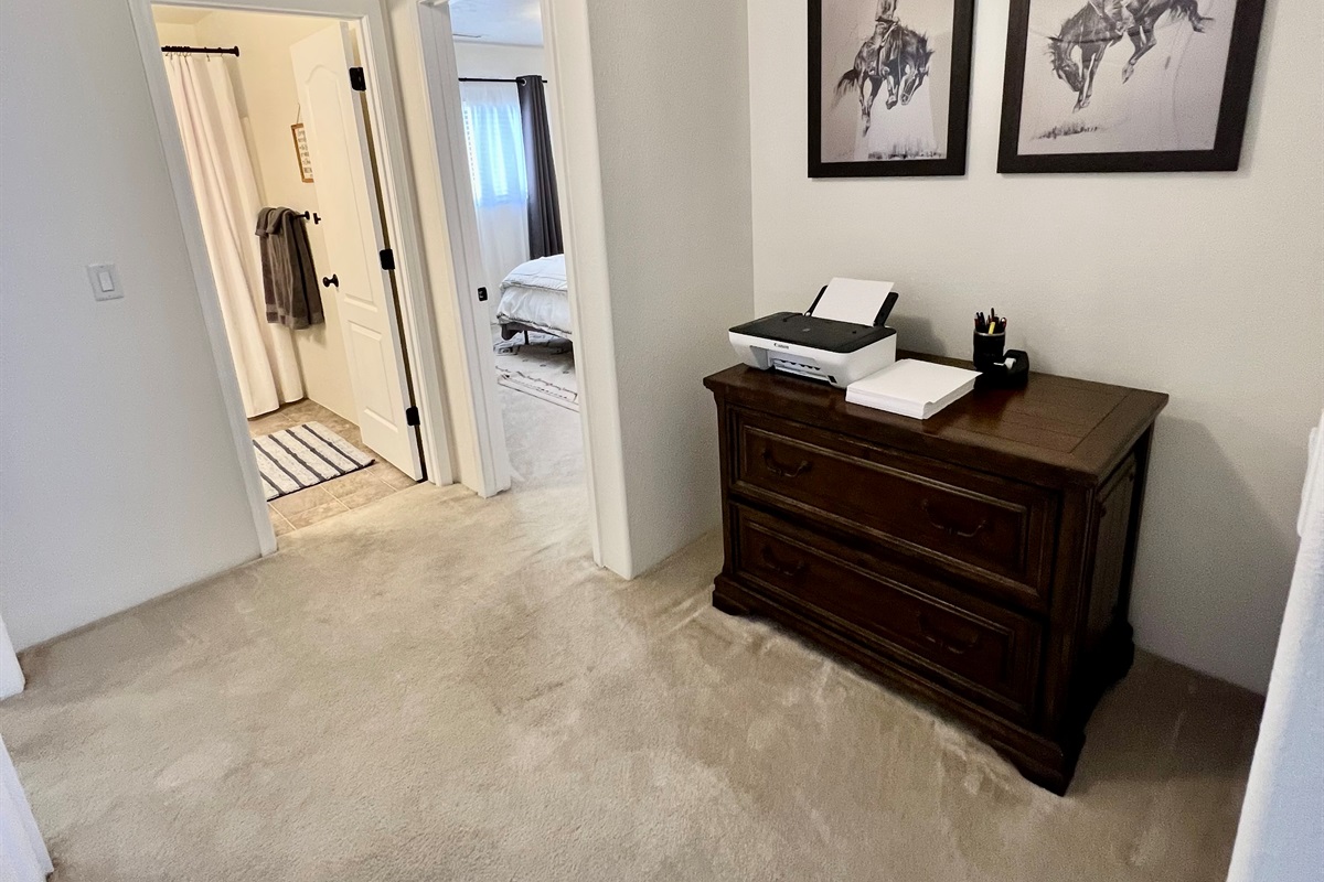 The dedicated office nook, complete with a desk and printer, is perfect for staying productive during your Prescott getaway.