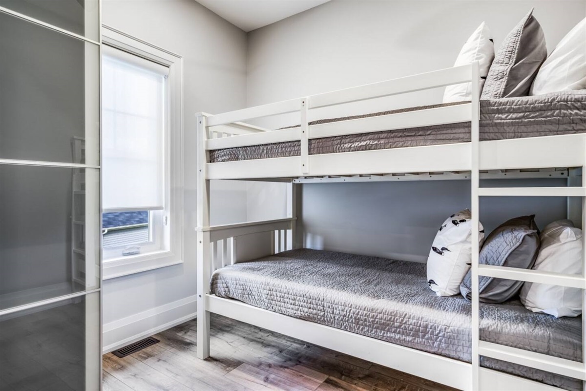 Bunk room for little adventurers to dream, play, and settle in for the night.