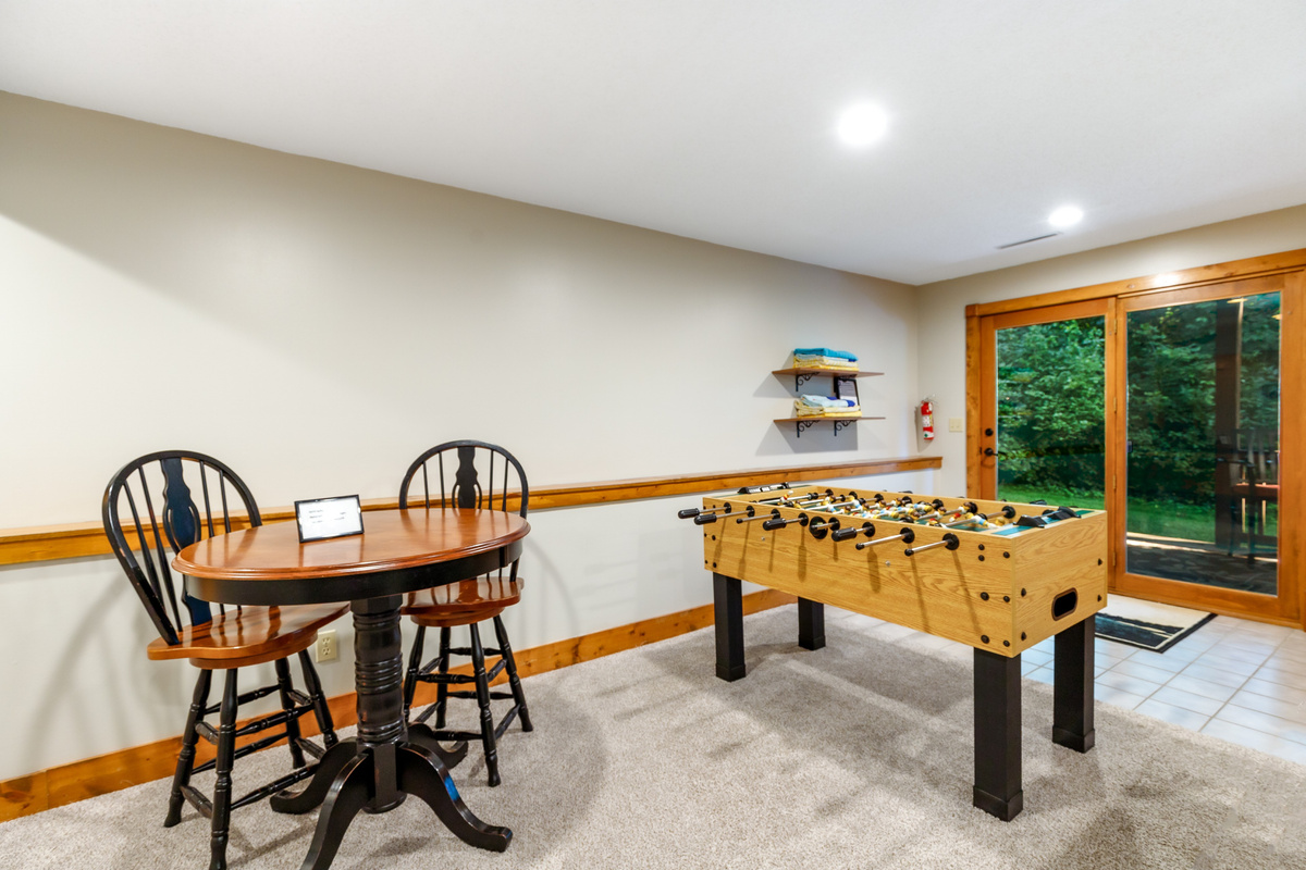Laptop-friendly workspace or Pub Table - your choice! And a foosball table + Pac-Man!