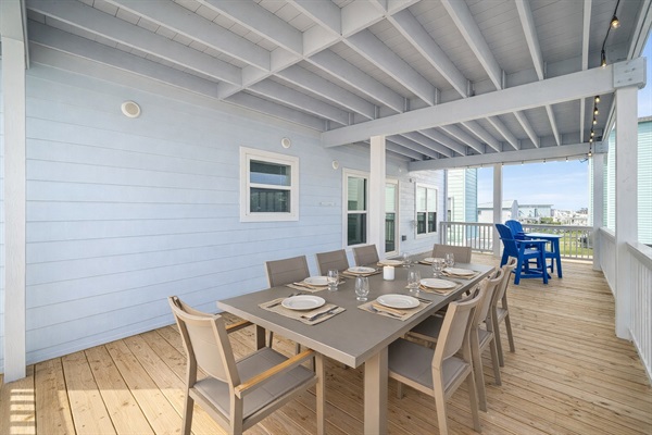 Covered Upper Deck Dining (Main Level): Enjoy shaded meals with coastal breezes.