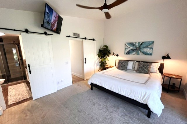 Primary with vaulted ceilings & direct patio access