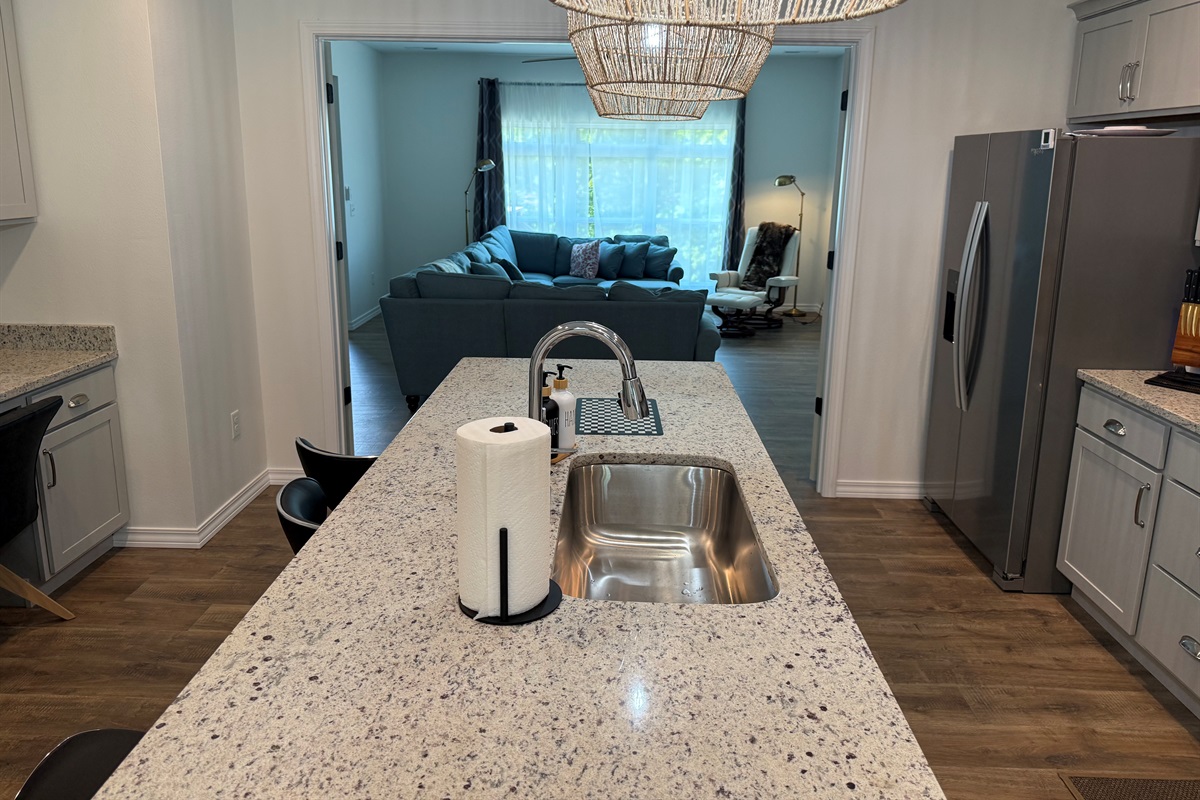 Large Kitchen island with sink and diswasher