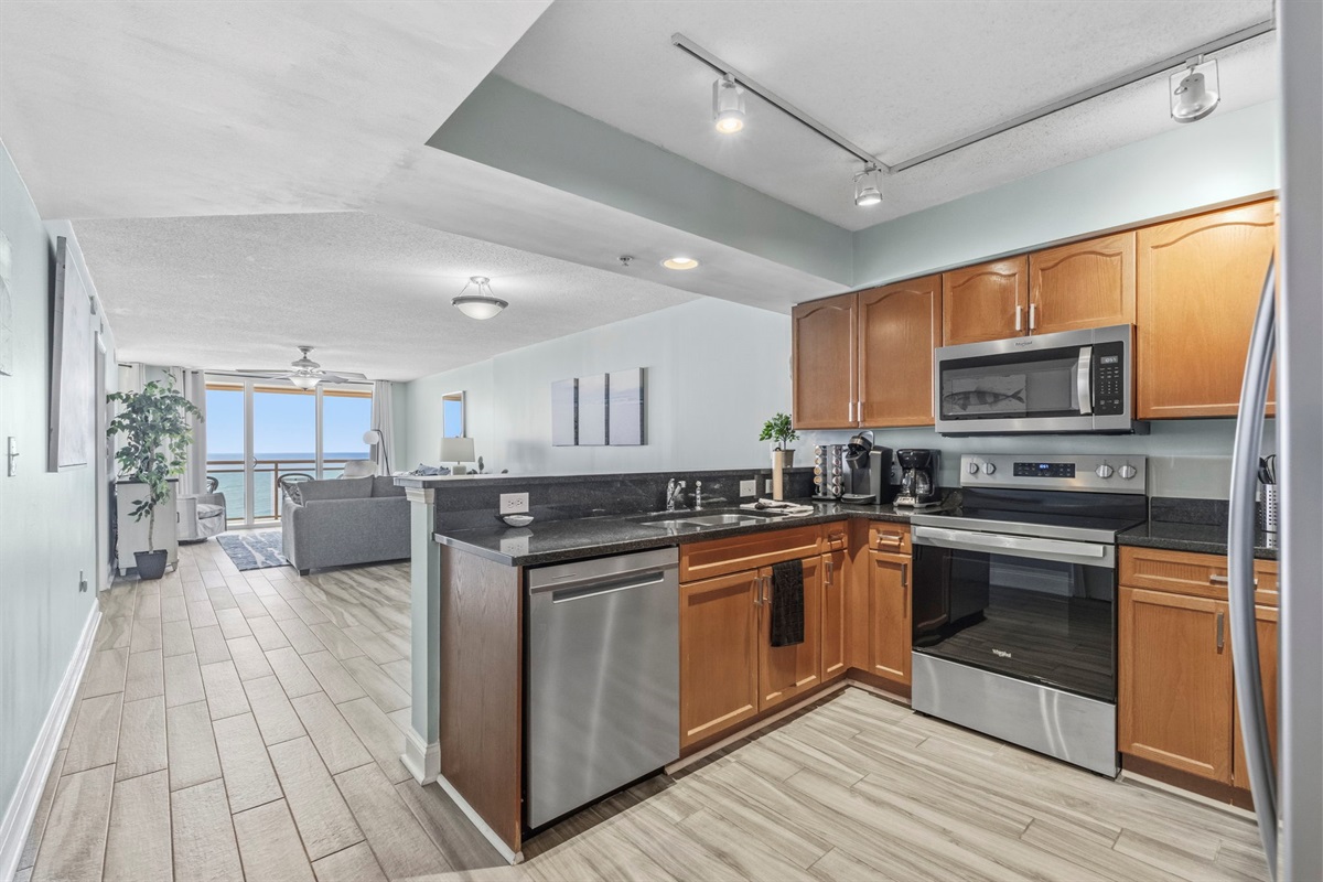 Beautiful Living Room and Kitchen with direct ocean views 