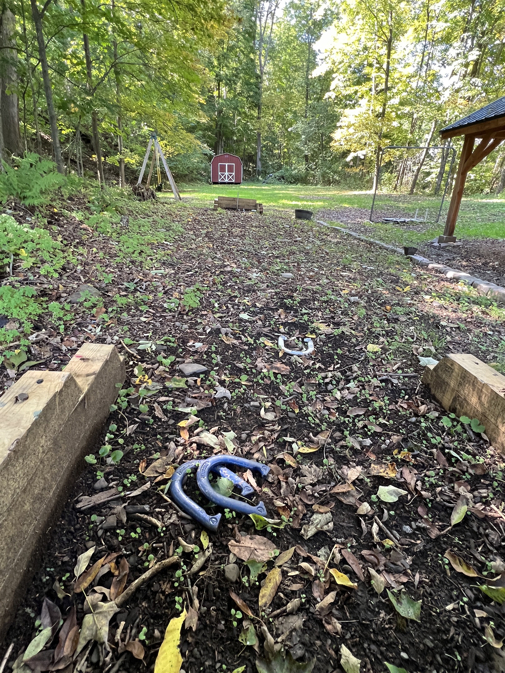 Horseshoe pits in the shared backyard with Moonlight Graham Doc.