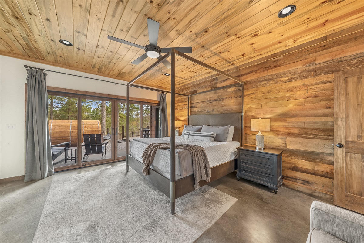 Downstairs king bedroom with ensuite bath and direct access to the deck.